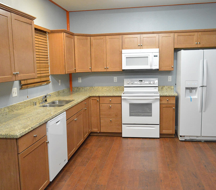 Shared kitchen facilities can include appliances and cupboard space.