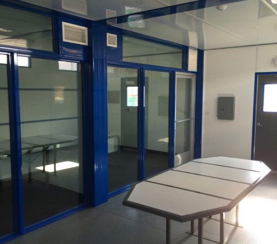 Office furniture, such as conference tables, can be built into the Cubes, eliminating the need to remove furniture when redeploying the Cube office in other locations.