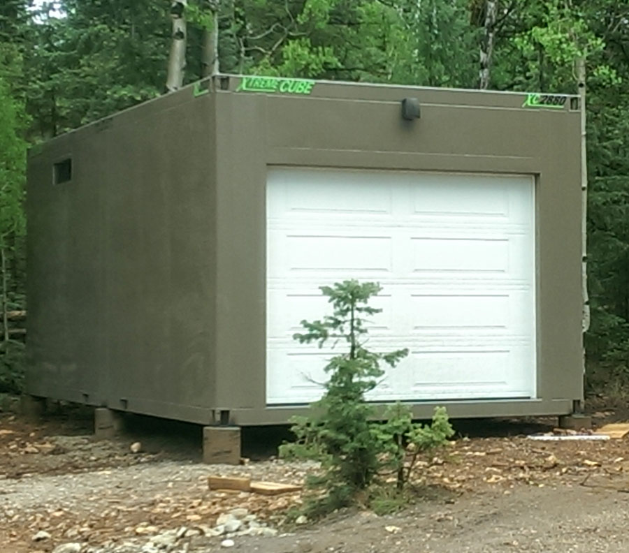 A standalone car garage during install.