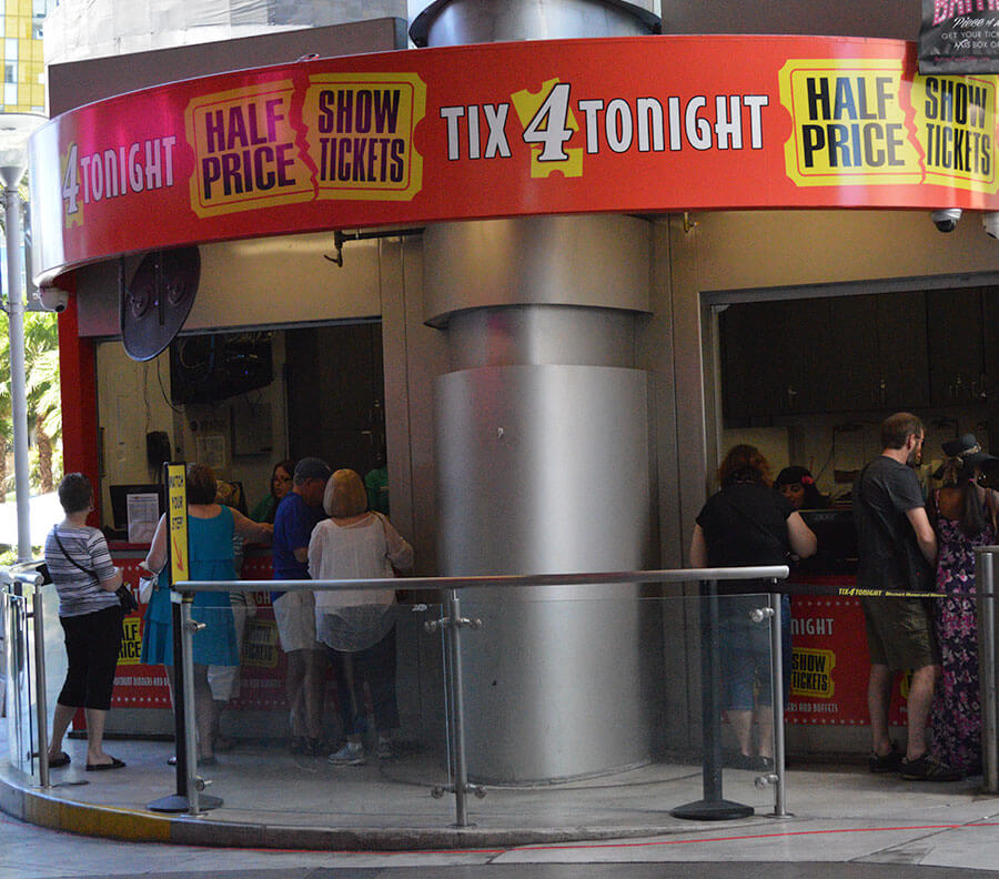 Standalone Xtreme Cube with counter-style window for ticket sales built around existing pillar.
