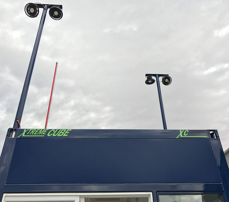 Adjustable light towers provide visibility at night.