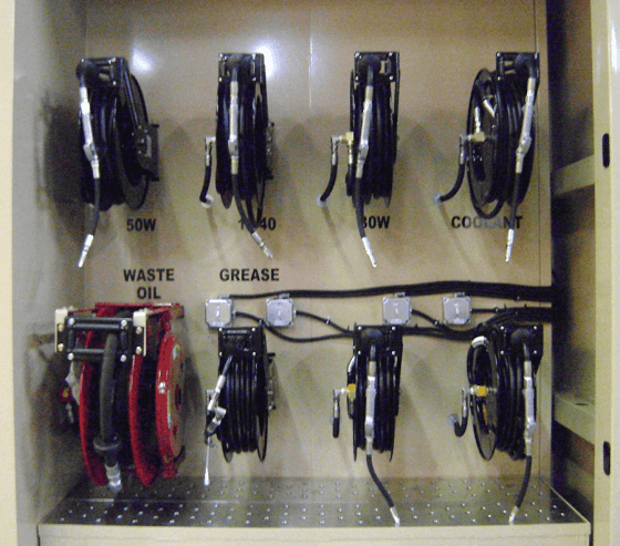 Integrated hose reels ensure the lube dispensary remains organized.
