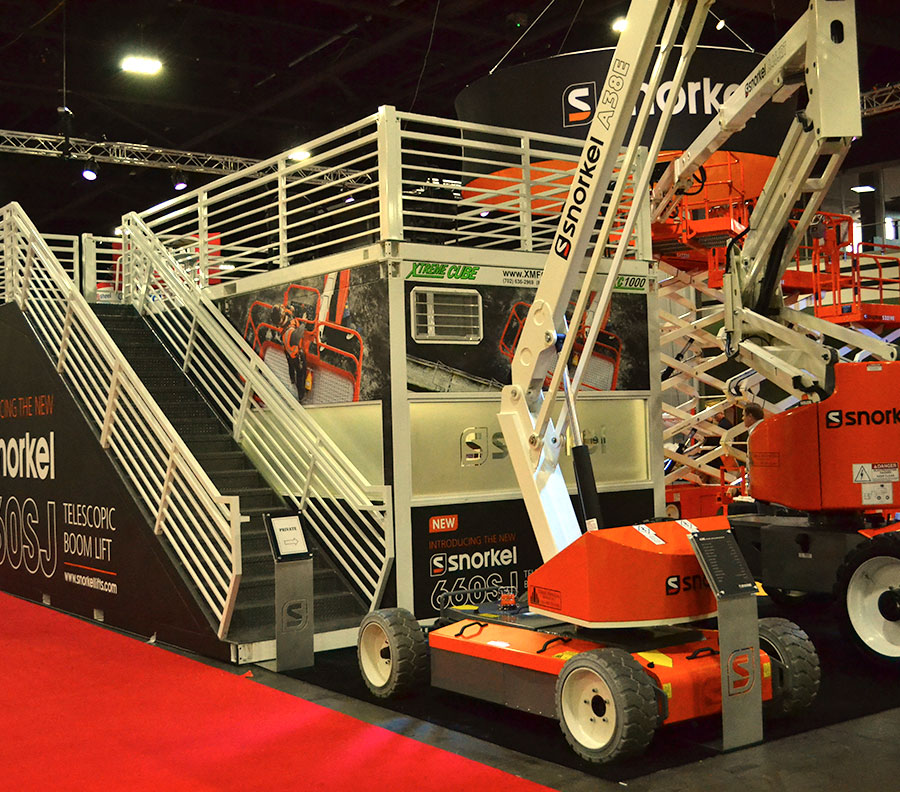 Xtreme Cubes provide private meeting rooms and storage facilities at indoor trade shows. A staircase and upper VIP viewing deck can maximize useful space from a limited booth footprint.