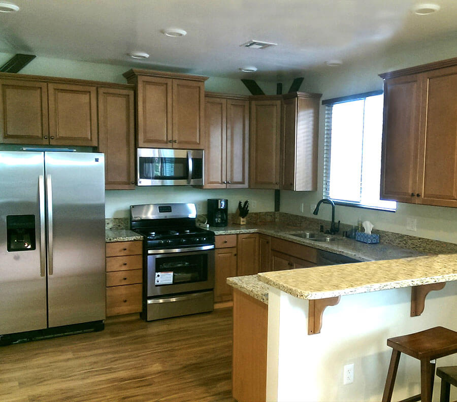 Fully equipped kitchens include appliances, plumbing and granite counter tops.